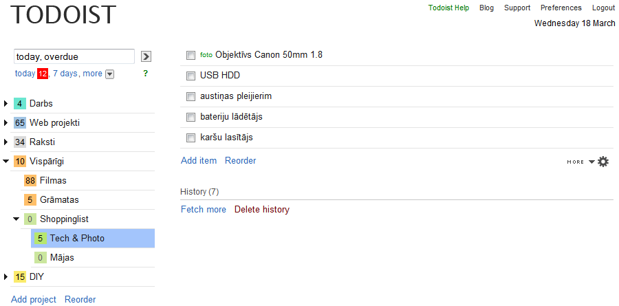 A screenshot of a Todoist task list. Categories include Darts, Web projects, Films, Books, Tech & Photo, and DIY. Tasks displayed are a 50mm Canon lens, USB HDD, headphones, battery charger, and card reader. The date shown is Wednesday, 18 March, with selected filtering for tasks due today or overdue.